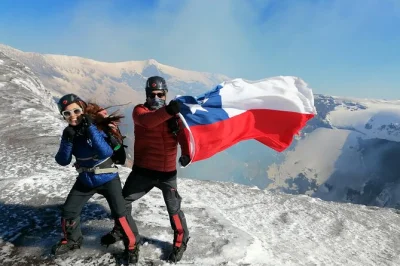 Feel the heat and wind on a guided villarrica volcano climb from pucón, summit with certified guides, then sled down snowy slopes. includes gear, snacks, and transport.