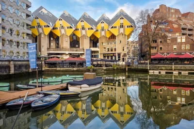 Start at rotterdam’s mirrored art depot, cross the erasmus bridge, and taste a stroopwafel in markthal. small group walking tour with local guide and city stories.