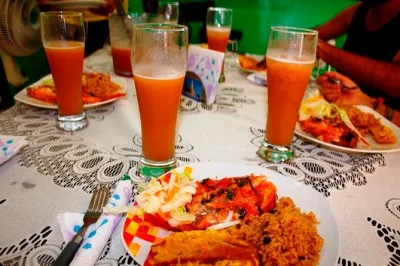 Feel the pulse of cartagena at bazurto market, taste tropical fruits, and cook local dishes in a lively home kitchen. includes hotel pickup and lunch.
