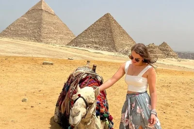 Feel the ancient desert come alive at the giza pyramids with a private guide, camel ride, skip-the-line entry, and lunch—includes pickup from your cairo hotel.