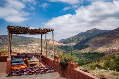 Wake up to the atlas mountains, wander berber valleys, sip mint tea by a stream, and share homemade lunch in a local home. small group tour with pickup from marrakech.