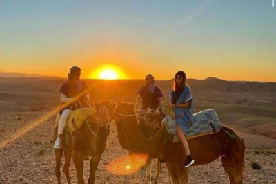 Feel the agafay desert’s quiet magic on a sunset camel ride near marrakech, sip mint tea, and share dinner under open skies. includes pickup and local guide.