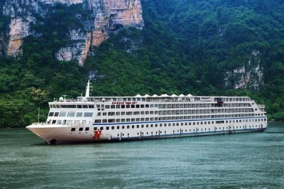 Float down the yangtze from chongqing to yichang, passing through the three gorges with shore excursions, local guides, and all meals included on board.
