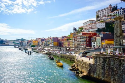 Start your porto day trip with a local guide, wander historic streets, taste port wine in gaia, and cruise under six bridges on the douro—all with pickup included.