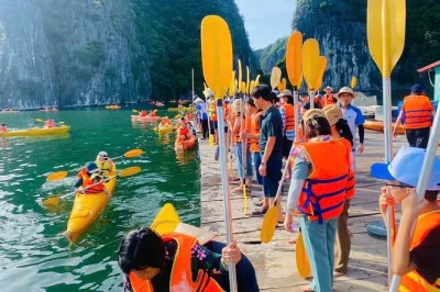 Feel the quiet side of lan ha bay on a full day boat tour from hanoi or cat ba. includes lunch, kayaking, swimming, and a sunset cooking class with local guide pickup.