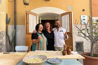 Step into bari’s winding alleys, visit the basilica san nicola, and join a hands-on pasta class with a local in her home. includes food, wine, and guide.