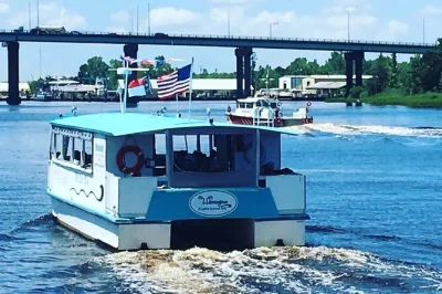 Feel the river breeze on a 50-minute wilmington boat cruise, see the battleship north carolina, and hear local stories from your captain. includes restroom onboard.