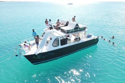 Swim grace bay’s barrier reef, snorkel with locals, visit iguana island, and share lunch on the sand. includes gear, drinks, and easy beach pickup.