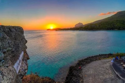 Feel the wild side of mauritius on a private southwest day trip—volcano crater, jungle waterfalls, grand bassin temple, colored earth, and a mauritian lunch with pickup.