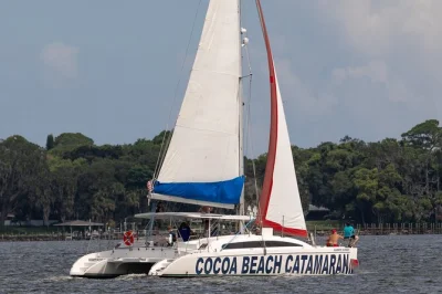 Feel the breeze on a cocoa beach catamaran, spot dolphins and manatees in banana river, and relax with shaded seating. includes drinks and local guide.