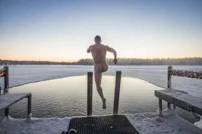 Step into lapland’s winter with a wood-fired sauna, icy lake swim, fireside salmon dinner and a chance to see the northern lights. includes hotel pickup.