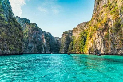 Start your day early from phuket with a small group sunrise speedboat tour to phi phi, maya bay, pileh lagoon, snorkeling stops, and a thai lunch included.