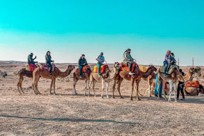 Step from marrakech into the agafay desert for a sunset camel ride, berber camp dinner, live music, and hotel pickup—all just 45 minutes away.