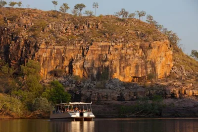 Feel the sandstone walls of nitmiluk gorge up close, walk between gorges, see ancient jawoyn rock art, and hear local stories on a guided cruise with live commentary.
