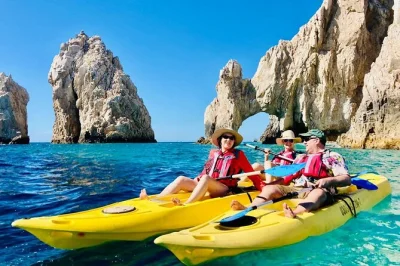 Paddle a glass bottom kayak to el arco, snorkel near pelican rock, and spot sea lions on this los cabos adventure—includes hotel pickup and guide.