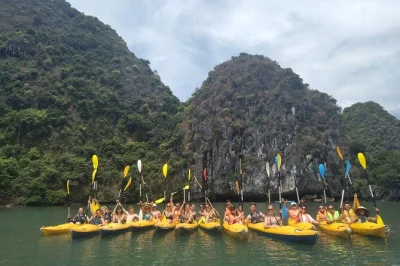 Float through lan ha & ha long bay, kayak hidden caves, swim at quiet beaches, and visit cai beo fishing village. small group cruise with lunch and pickup.