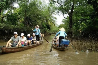 Wake up to the mekong delta’s quieter side—row sampan boats, taste local chocolate, cook lunch with villagers, and cycle peaceful cai be. includes hotel pickup.