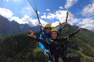 Feel the rush of a tandem paragliding flight over stubai valley, tyrol. includes elferlift ride, certified pilot, photos, and post-flight lounge time.