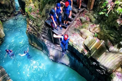 Viva a emoção das 27 cachoeiras de damajagua perto de puerto plata, com traslado do porto, guia local e almoço típico dominicano — ideal para quem está em cruzeiro.
