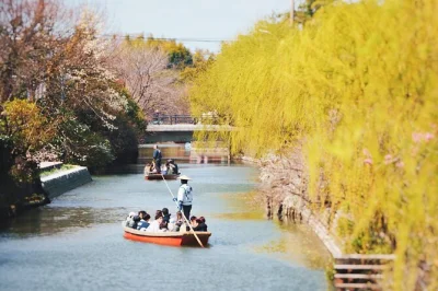 Experience dazaifu tenmangu shrine and yanagawa river cruise from fukuoka. includes train tickets, boat ride, english guide, and umegae-mochi treat.
