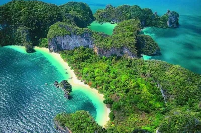Feel the breeze on a private hong islands & 4 islands tour by longtail boat, with sunset at railay beach, night snorkel, lunch, and hotel pickup included.