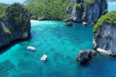 Swim at maya bay, snorkel coral reefs at khai island, meet monkeys on monkey beach. includes hotel pickup, lunch, and english-speaking guide.