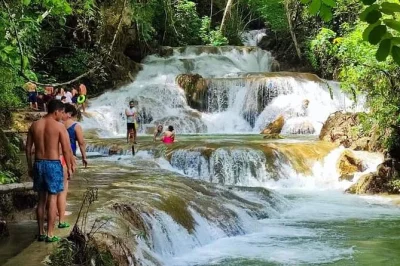 Feel the cool pools of copalitilla waterfalls near huatulco, taste fresh coffee with locals, and enjoy a traditional meal. includes pickup, guide, and entry.