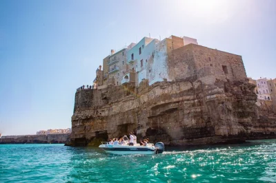 Feel the salty breeze on a polignano a mare boat tour, explore famous caves, enjoy prosecco & taralli on board, and swim with a small group. includes refreshments.