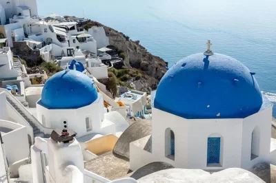 Feel the colors of santorini on a 5-hour shore excursion—explore oia, stroll megalochori’s alleys, relax at perivolos black beach. includes pickup & local guide.