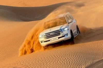 Dubai wüstensafari mit kamelritt, dune bashing und bbq-dinner. inklusive hoteltransfer, live-shows und sandboarding. jetzt platz sichern!