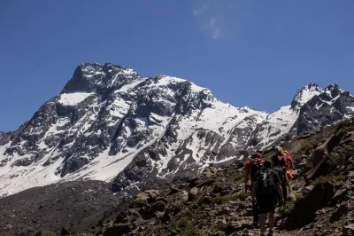 Feel the andes up close on a cajón del maipo volcano hike from santiago, with hotel pickup, local guide, gourmet sandwich lunch, and a glass of chilean wine.
