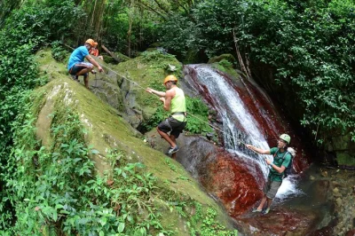 Feel the rush near san juan with ziplining, 80-foot waterfall rappelling, and a riverside hike—plus a homemade puerto rican lunch. includes pickup.