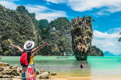 Phuket day trip to phang nga bay and james bond island by big boat, with cave canoeing, swimming, and buffet lunch included. hotel pickup and english guide.
