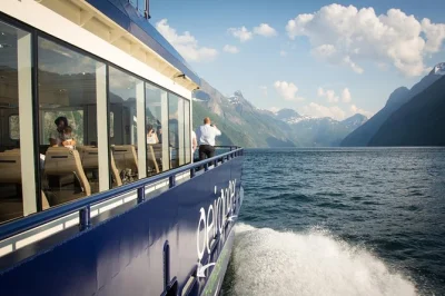 Feel the wild beauty of norway’s fjords on a cruise from Ålesund to geirangerfjord. see the seven sisters waterfalls, enjoy local stories, and stop in geiranger village. includes return trip.