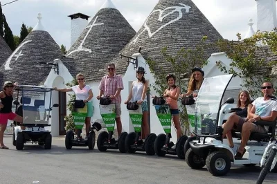 Roll through alberobello’s trulli districts by segway or mini golf cart, explore inside a real trullo, and see the panoramic view with a local guide. includes all equipment.
