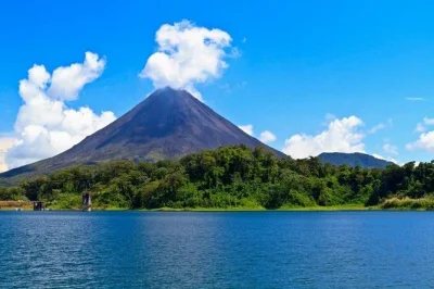 Wake up by lake arenal, walk mistico hanging bridges, and soak in mineral hot springs on a full-day tour from guanacaste with breakfast, lunch, and hotel pickup.