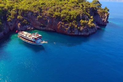 Chill on a marmaris boat trip with swimming stops, bbq lunch, and unlimited soft drinks. includes hotel pickup and a friendly local crew—easy, sun-soaked day at sea.