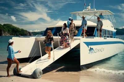 Feel the sea breeze on a tortuga island catamaran day trip from los sueños marina, with snorkeling, banana boat rides, eco hike, and a costa rican beach lunch included.