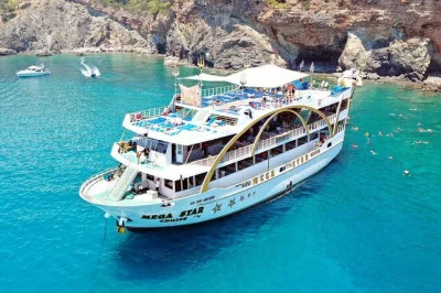 Erlebe die bootstour von antalya nach kemer auf der mega star, schwimme in den buchten phaselis & cennet, feiere eine schaumparty und genieße ein mittagessen. inklusive bequemer hotelabholung.