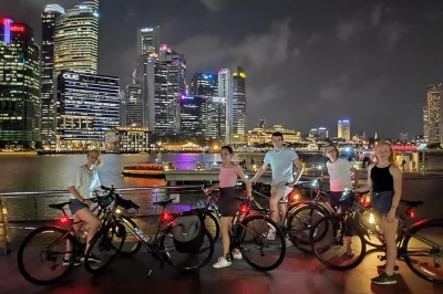 Feel the city lights on a singapore night cycling tour—marina bay, merlion park, f1 pit building, and more. includes bike rental, local guide, lockers & bottled water.