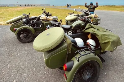 Sinta o vento no rosto em um sidecar vintage pelas praias do dia d na normandia, com paradas em omaha beach, pointe du hoc e no cemitério americano. inclui transporte.