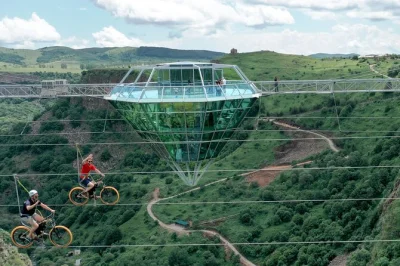 Feel the thrill of dashbashi canyon’s glass bridge, try honey in a georgian village, and hike to waterfalls on this day trip from tbilisi with local guide and transport.