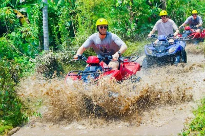 Feel the mud on a bali atv ride, meet cheeky monkeys in ubud, and cool off at tegenungan waterfall. includes lunch, all tickets, and local guide pickup.