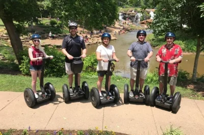 Feel the buzz of greenville by segway, gliding from downtown to the west end and rolling along the swamp rabbit trail with a local guide. includes helmet and training.