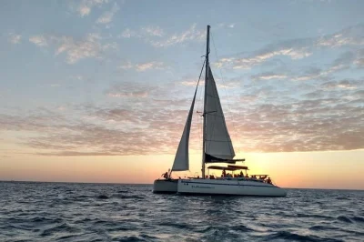 Feel the sea breeze off tamarindo on a sunset catamaran cruise, snorkel hidden coves, and enjoy a chef-prepared lunch with open bar. includes beach pickup.