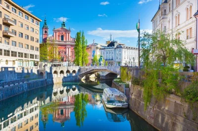 Feel ljubljana from river, street & rooftop on this guided tour with boat cruise, old town walk, local cake tasting, and a panoramic city view. includes guide & tickets.