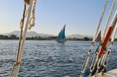 Float past luxor temple at sunset on a private felucca sail, with hotel pickup, tea on board, and views of both nile banks. experience luxor’s golden hour.