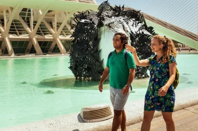 Hear the city’s heartbeat in valencia with a private walk, taste a local treat at central market, and climb the serranos towers—includes guide & flexible route.