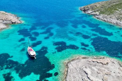 Feel the salt air on a turkish gulet from paros to antiparos, blue lagoon, and despotiko. includes lunch, unlimited drinks, and snorkeling gear—just bring your swimwear.