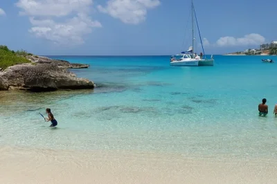 Feel the breeze on a sint maarten catamaran, snorkel hidden bays, float at maho beach, and enjoy a caribbean buffet lunch. includes open bar and snorkeling gear.